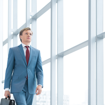 Man Walking Down Corridor