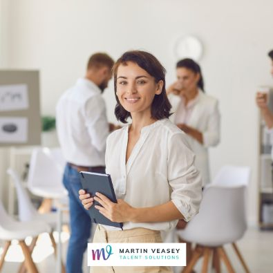 Leadership in the Era of Corporate Social Responsibility (CSR) by Martin Veasey Talent Solutions - Person Holding a Notebook