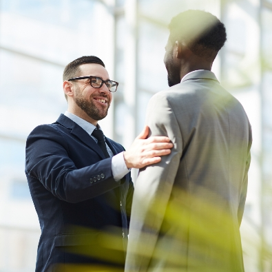 Two Professionals Greeting